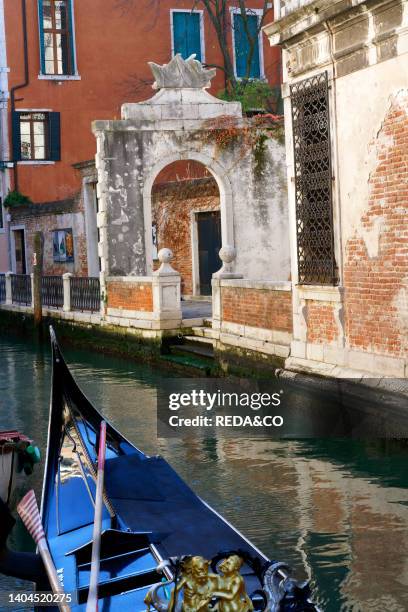 Moored gondola, Gradenigo canal, Sestiere Santa Croce district, Venice, Veneto, Italy, Europe.