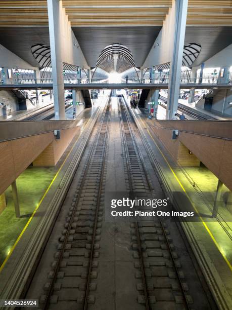 Seville, Spain - 16 June 2016; commuters in view; pre-COVID. Seville-Santa Justa railway station is the main terminus of Seville, Andalusia. It was...