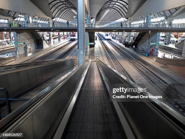 Seville, Spain - 16 June 2016; commuters in view; pre-COVID. Seville-Santa Justa railway station is the main terminus of Seville, Andalusia. It was...