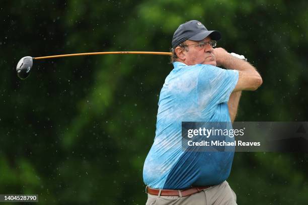 Commentator Chris Berman plays his shot from the 13th tee during the pro-am prior to the Travelers Championship at TPC River Highlands on June 22,...