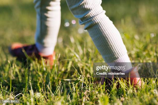 close up shot of a childâs legs - moving toward stock pictures, royalty-free photos & images