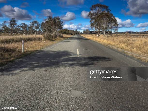 lonely braidwood road outside tarago on the nsw southern tablelands. - nsw stock pictures, royalty-free photos & images