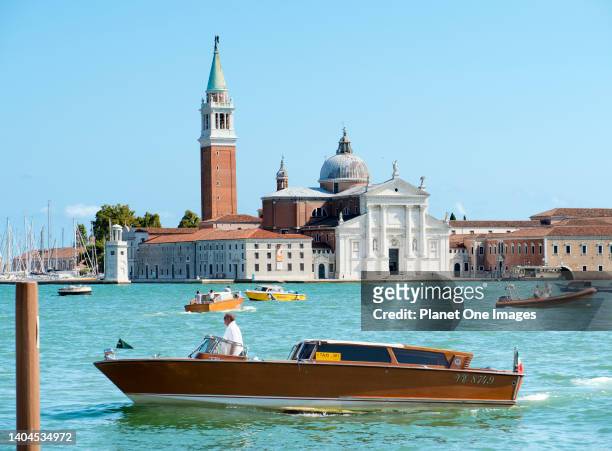 The Basilica di Santa Maria della Salute, church, Venice, with water taxi.