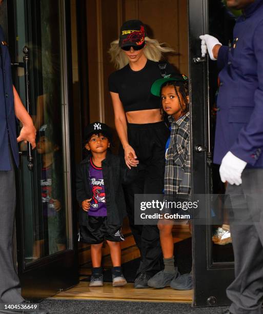 Kim Kardashian, Saint West, and Psalm West depart their hotel on June 22, 2022 in New York City.