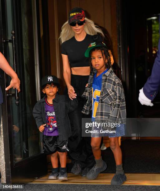 Kim Kardashian, Saint West, and Psalm West depart their hotel on June 22, 2022 in New York City.