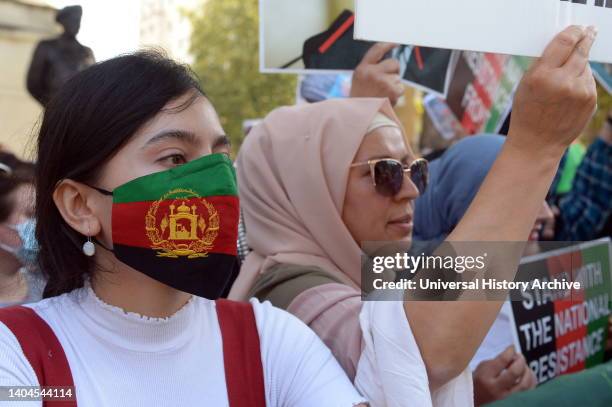 Afghans rally in Whitehall, London to protest against the Taliban takeover amid the COVID-19 coronavirus pandemic.