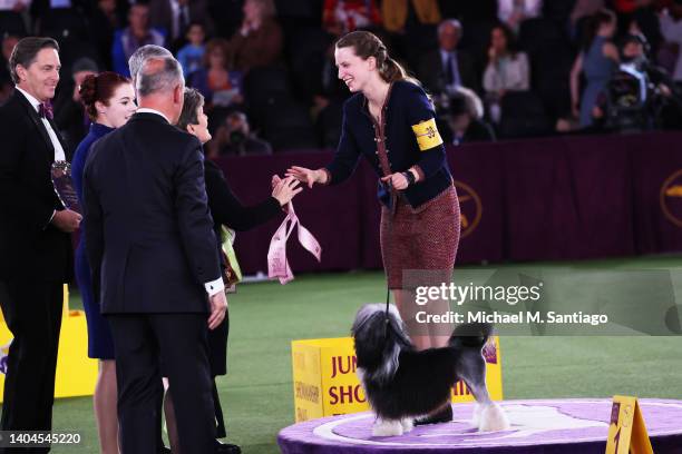 Erin Bernecker is given a ribbon after winning the Junior Showmanship competition during the annual Westminster Kennel Club dog show at the Lyndhurst...