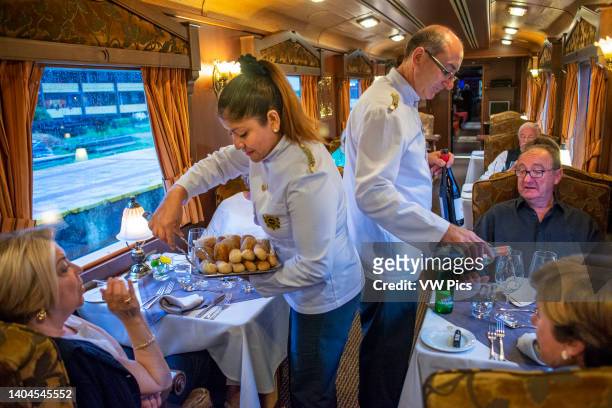Interior of restaurant car railway carriage of Transcantabrico Gran Lujo luxury train travellong across northern Spain, Europe. First Class dining...