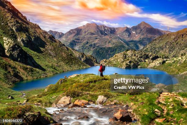 Sotllo pond in the Catalan Pyrenees in summer on the way of the Pica d'Estats massif in Alt Pirineu Natural Park, Catalonia, Spain, Pyrenees. Ascent...