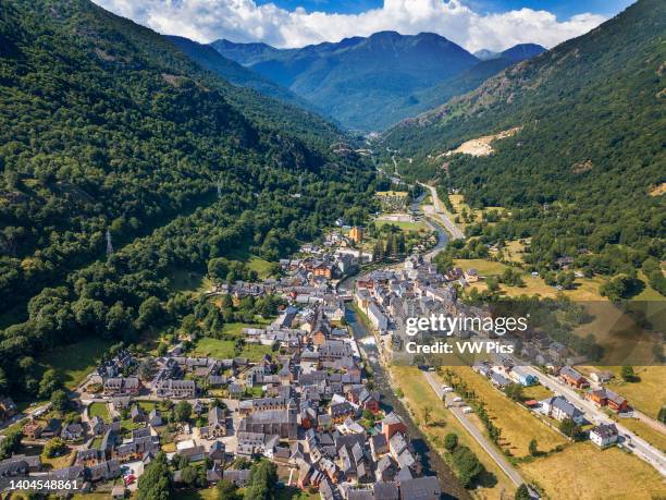 Aerial view of the Garonne River as it passes through Les. Village of Les or Lés in Aran Valley in Pyrenees Lleida Catalonia Spain. It borders...