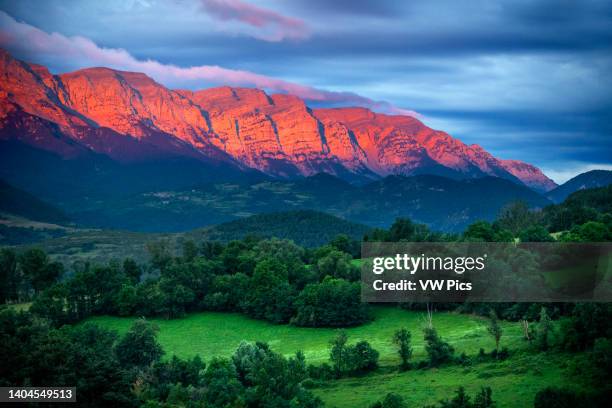 Panoramic view of the Cadí mountain range seen from Prullans village . The Sierra del Cadí or El Cadí is a mountain range in the Pre-Pyrenees located...