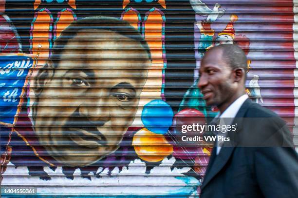 Wall mural art mosaic on a facade in Harlem, Manhattan, New York City, New York, USA, North America. In the early 20th century, the neighborhood of...