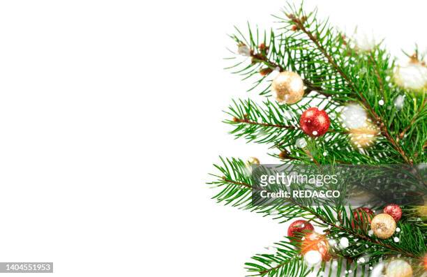 Christmas or New Year background with fir branches and holiday decor on white background, copy space..