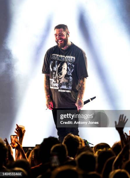Post Malone performs on stage as Spotify hosts an evening of music with star-studded performances with The Black Keys and Post Malone, during Cannes...