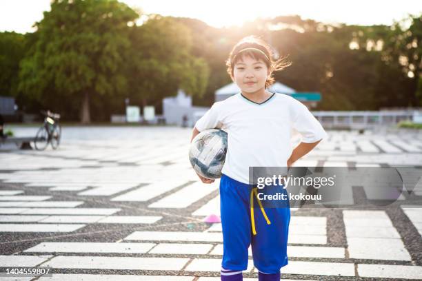 japanese girl who wants to be a soccer player. - young athletes stock pictures, royalty-free photos & images