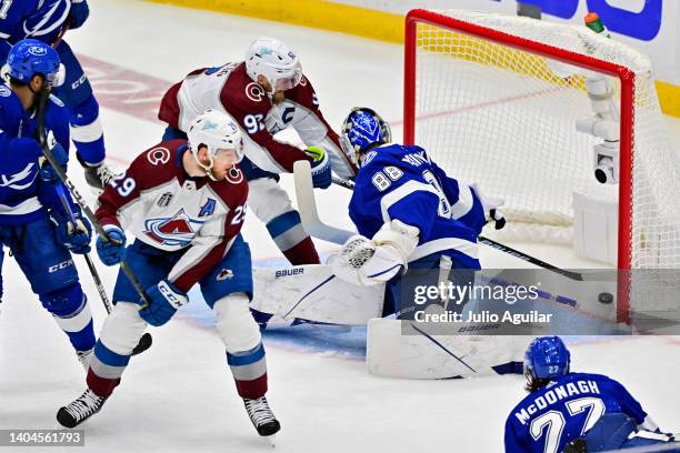 Gabriel Landeskog of the Colorado Avalanche scores a goal against Andrei Vasilevskiy of the Tampa Bay Lightning during the second period in Game Four...