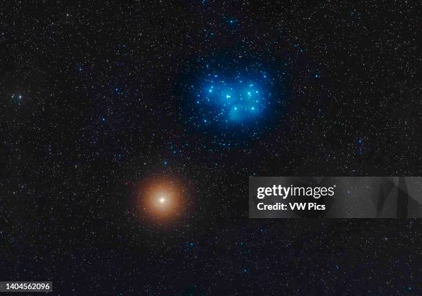 This is red Mars passing below the blue Pleiades star cluster on the evening of March 3, 2021. Taken on a night with some high cloud and haze adding...