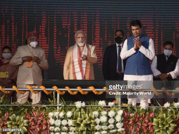 Prime Minister Narendra Modi waves and speaks to supporters during the inauguration of a new Integrated Terminal Building at the Maharaja Bir Bikram...