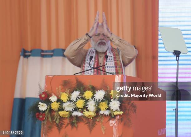 Prime Minister Narendra Modi waves and speaks to supporters during the inauguration of a new Integrated Terminal Building at the Maharaja Bir Bikram...