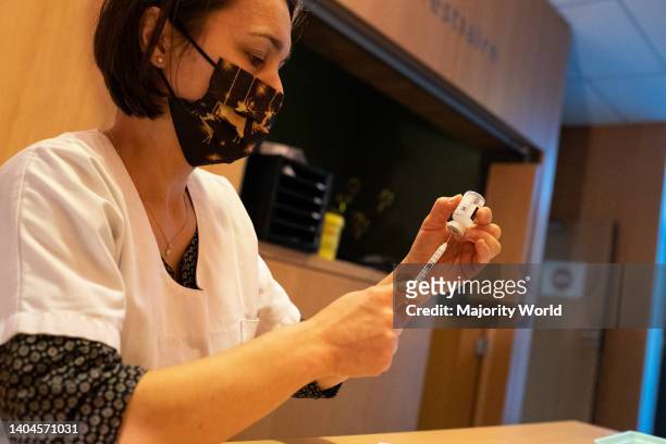 Preparation of vaccine doses at a Covid-19 vaccination center in Dinan, Brittany. France.