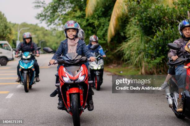 group of friends and family doing road trip on motorcycle ride - motorcycle group stock pictures, royalty-free photos & images