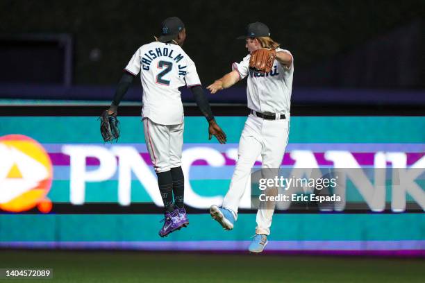 Jazz Chisholm Jr. #2 of the Miami Marlins and Luke Williams celebrate after defeating the Colorado Rockies at loanDepot park on June 22, 2022 in...