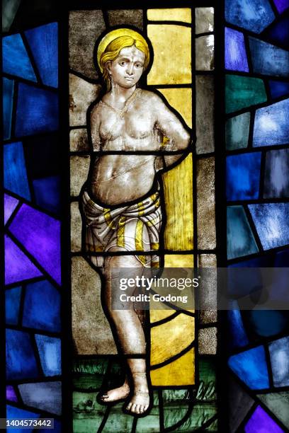 Museum of the Milan Cathedral. Stained glass window. Catherine of Alexandria. The flagellation. 16 th century. Italy.
