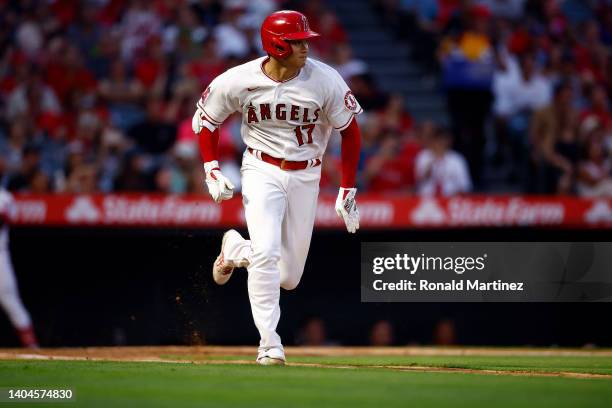 Shohei Ohtani of the Los Angeles Angels hits a single against the Kansas City Royals in the third inning at Angel Stadium of Anaheim on June 22, 2022...