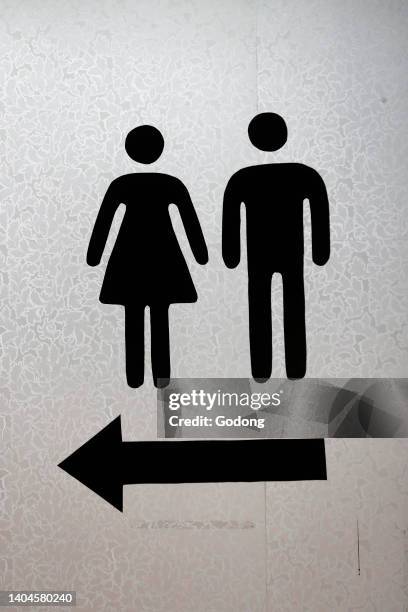Toilet sign painted on a wall. Italy.