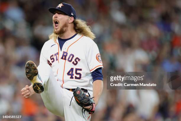 Ryne Stanek of the Houston Astros reacts to striking out Dominic Smith of the New York Mets to get out of the sixth inning with the bases loaded at...