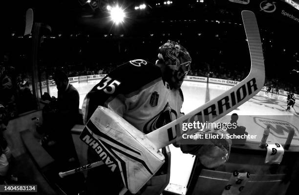 Goaltender Darcy Kuemper of the Colorado Avalanche pushes over the pucks and takes the ice for warm ups before playing against the Tampa Bay...