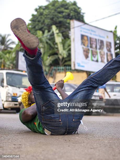 Cameroonian fan in joy in a street in Libreville on January 14, 2022 during the Cameroon-Ethiopia match for the 2021 African Cup of Nations. Cameroon...