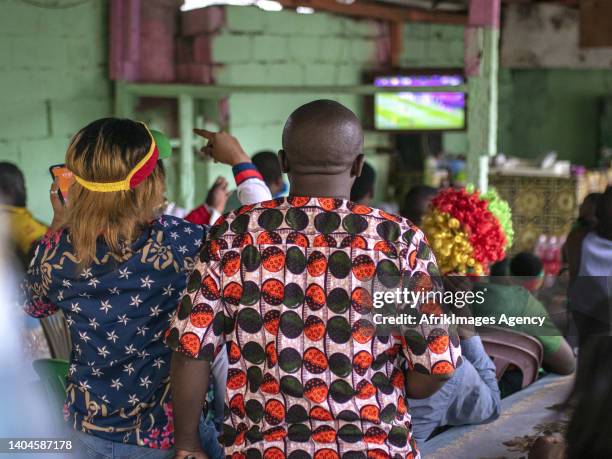 Cameroonian fans watch the Cameroon-Ethiopia match for the 2021 Africa Cup of Nations in Cameroon, January 14 in a makeshift Cameroonian restaurant...