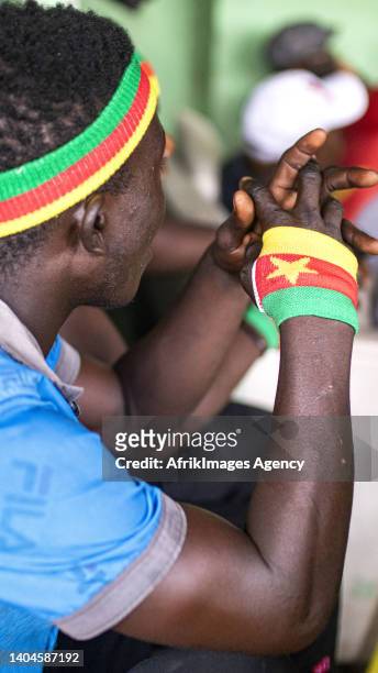 Cameroonian fan watch the Cameroon-Ethiopia match for the 2021 Africa Cup of Nations in Cameroon, January 14 in a makeshift Cameroonian restaurant in...