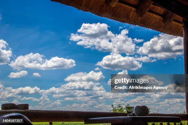 Clouds seen from a wooden deck in a hotel in Kasane on March 23, 2016. Des nuages vus d'une terrasse en bois dans un hotel a Kasane le 23 Mars 2016.