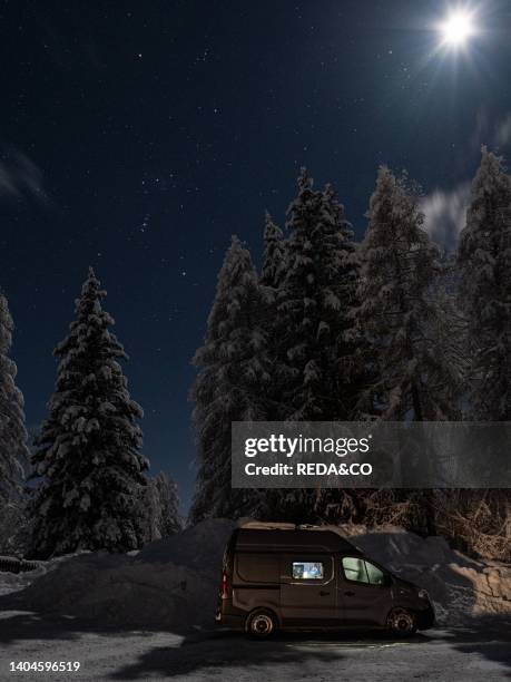 Snowy landscape at dusk at the Serot refuge on the Roncegno mountain, Valsugana, Trentino, Italy, Europe.