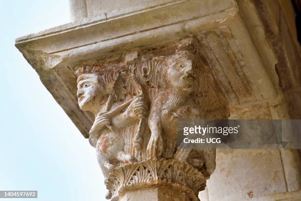 Lecce, Casalabate township of Abbey of Santa Maria di Cerrate, portico , detail of imaged capitals.