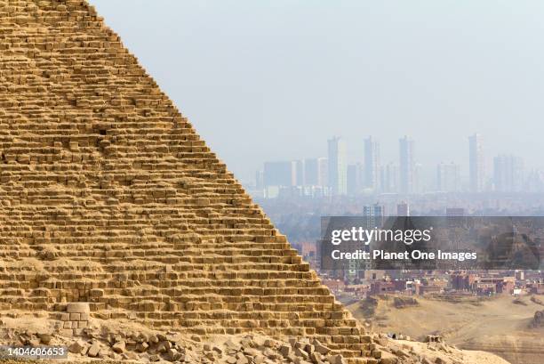 The pyramids at Giza, Egypt, Cairo in the background 2.