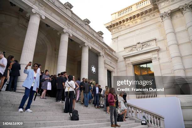 Guests attend Montblanc Cocktail : "On The Move" Montblanc Extreme Launch At Palais Galliera at Palais Galliera on June 22, 2022 in Paris, France.