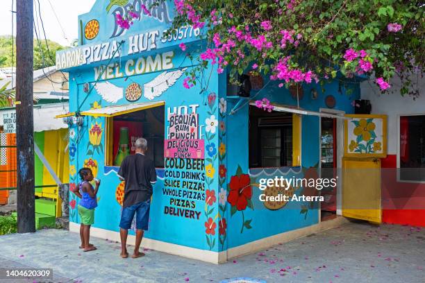 Takeaway pizza shop/restaurant in capital town Port Elizabeth on the island Bequia, part of the nation Saint Vincent and the Grenadines, Caribbean.