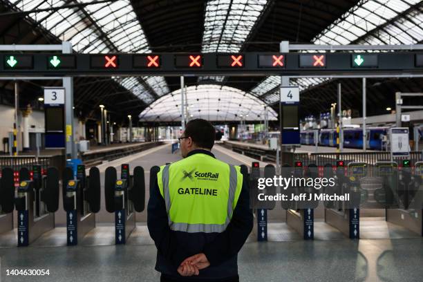 Members of the public make their way through Queen Street station as the second 24-hour rail strike is under way across Scotland after the latest...