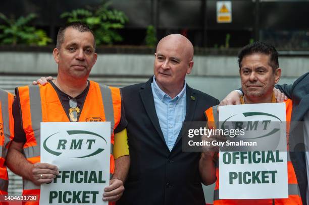 General Secretary Mick Lynch visits the picket line at Euston station to speak with striking RMT members and pose for photos with them on June 23,...