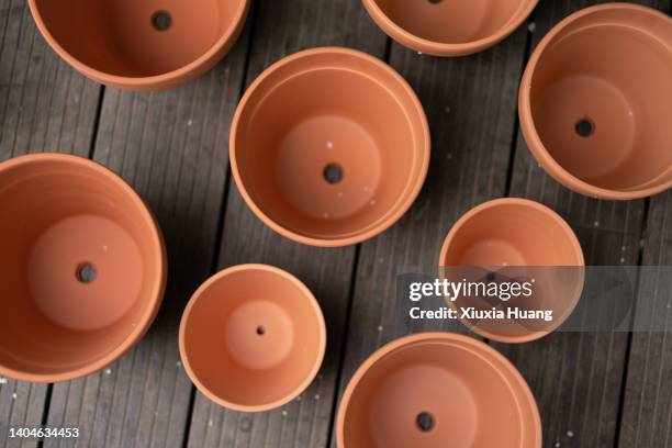 orange terracotta pot - terracotta stock pictures, royalty-free photos & images