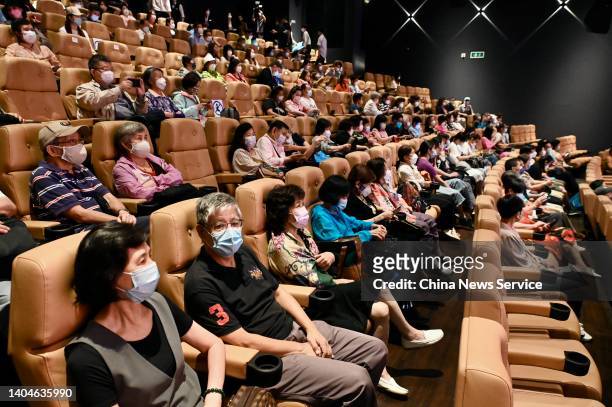 People watch film "Look Up" at a cinema on June 23, 2022 in Hong Kong, China. The film was screened on Thursday in Hong Kong to celebrate the 25th...
