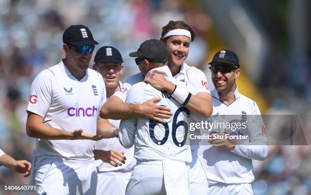 England bowler Stuart Broad celebrates with Joe Root after the pair combine to dismiss Tom Latham during day one of the third Test Match between...