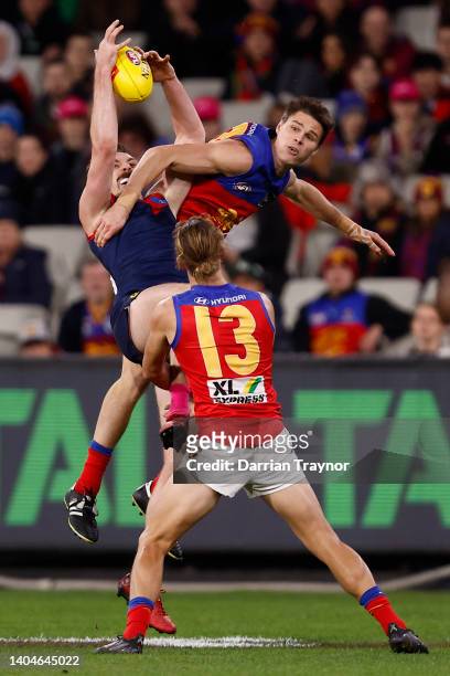 Jake Lever of the Demons marks the ball during the round 15 AFL match between the Melbourne Demons and the Brisbane Lions at Melbourne Cricket Ground...