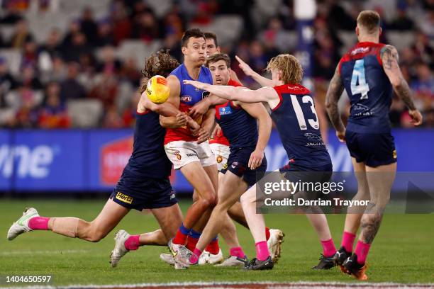 Hugh McCluggage of the Lions handballs during the round 15 AFL match between the Melbourne Demons and the Brisbane Lions at Melbourne Cricket Ground...