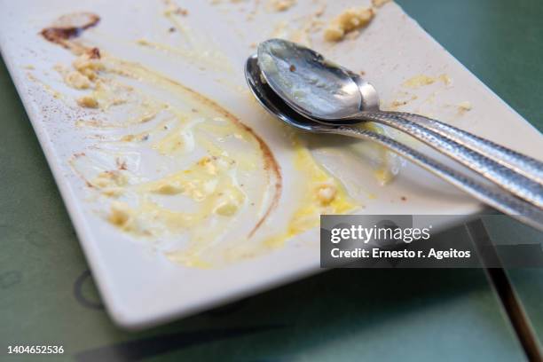 empty white dish with dessert remains - smula bildbanksfoton och bilder