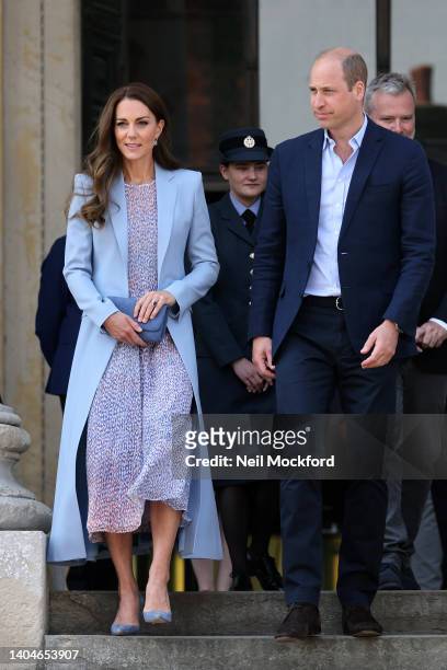 Catherine, Duchess of Cambridge and Prince William departing the Fitzwilliam Museum during an official visit to Cambridgeshire on June 23, 2022 in...