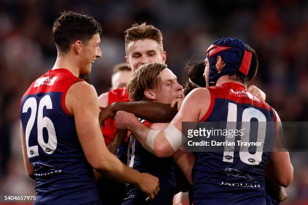 Charlie Spargo of the Demons celebrates a goal during the round 15 AFL match between the Melbourne Demons and the Brisbane Lions at Melbourne Cricket...